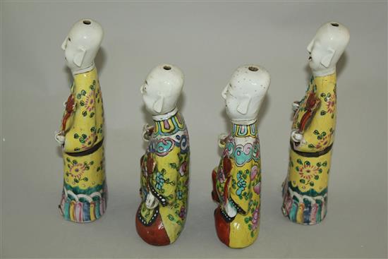 Four Chinese enamelled porcelain figures of the He He Erxian, late 18th / early 19th century, 17cm and 20.5cm